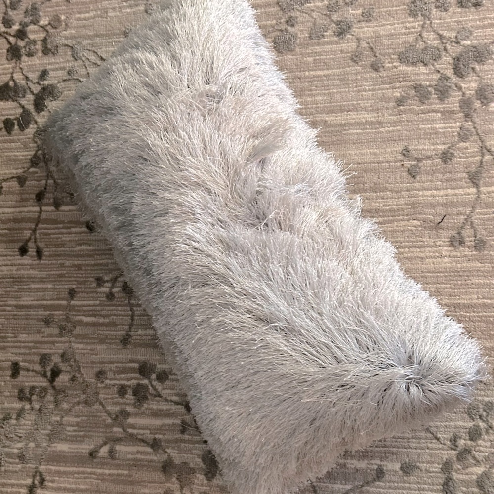 2 gray oblong throw pillows